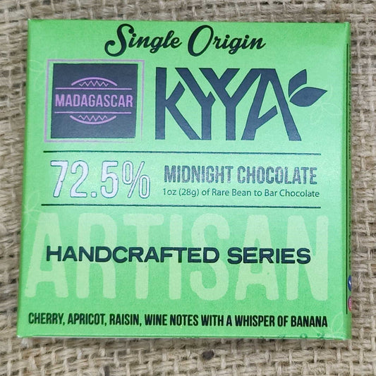 A green wrapper of a Madagascar Single Origin Chocolate bar with the brand name KIYAA and the percentage of 72.5% indicated.